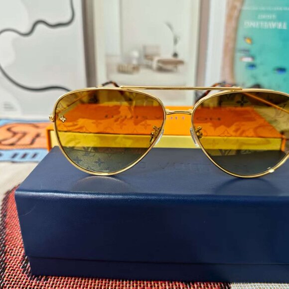 Stylish Louis Vuitton Gold Sunglasses with Brown Lenses